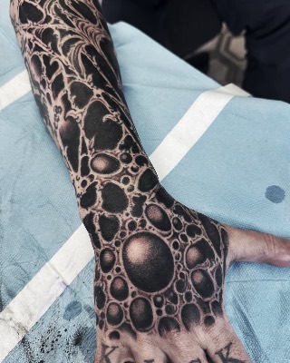 Blackwork — Hand In Glove Tattoo
