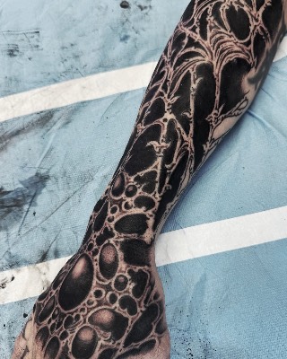Blackwork — Hand In Glove Tattoo