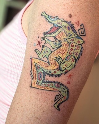 Lizard, crocodile and temporary tattoo on the upper arm, Sketch style, by Slowpoke Tattoo in Austin, TX
