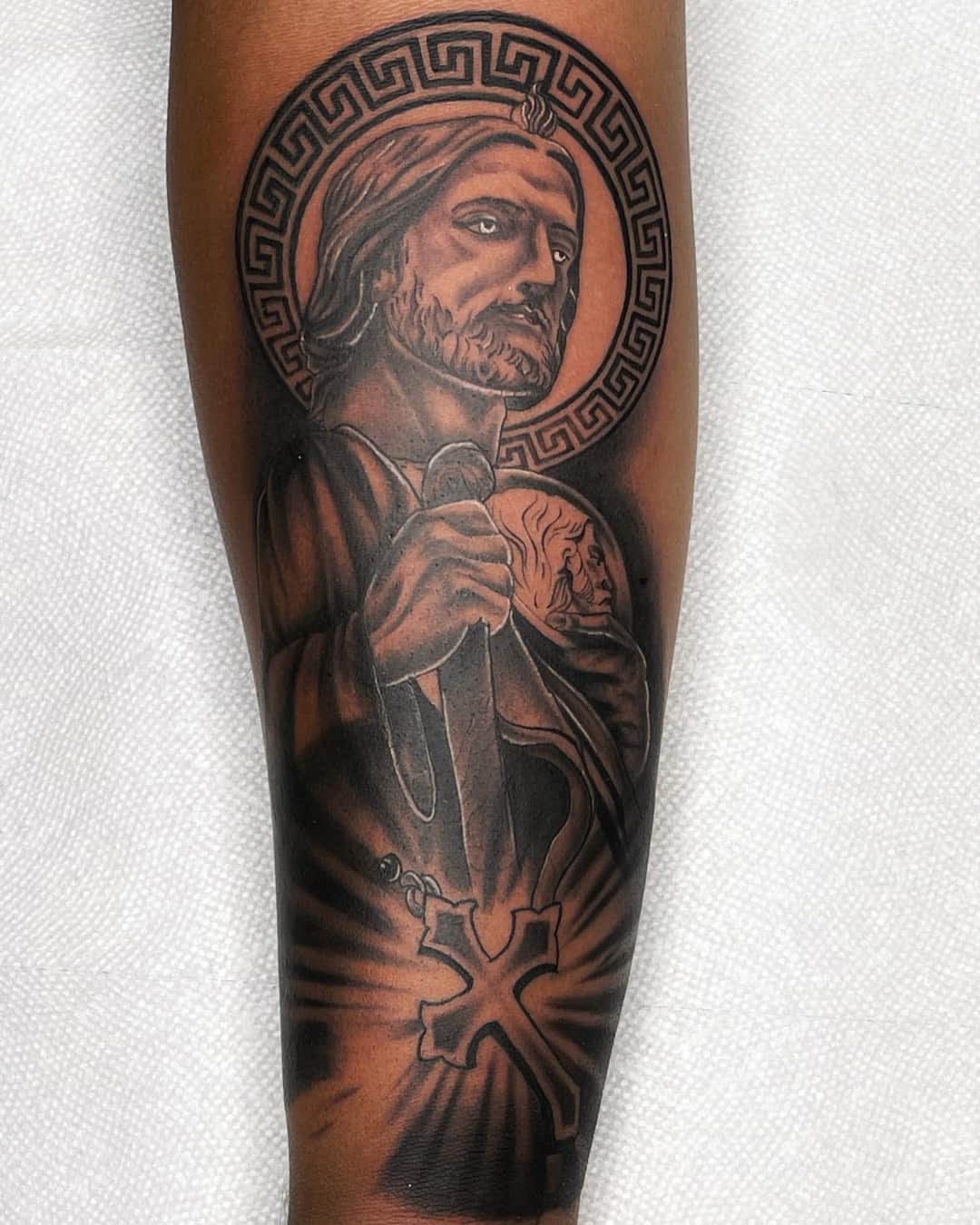Cross, madonna and saint jude tattoo on the forearm, half sleeve, Chicano style, by Inksane Shorty in Austin, TX