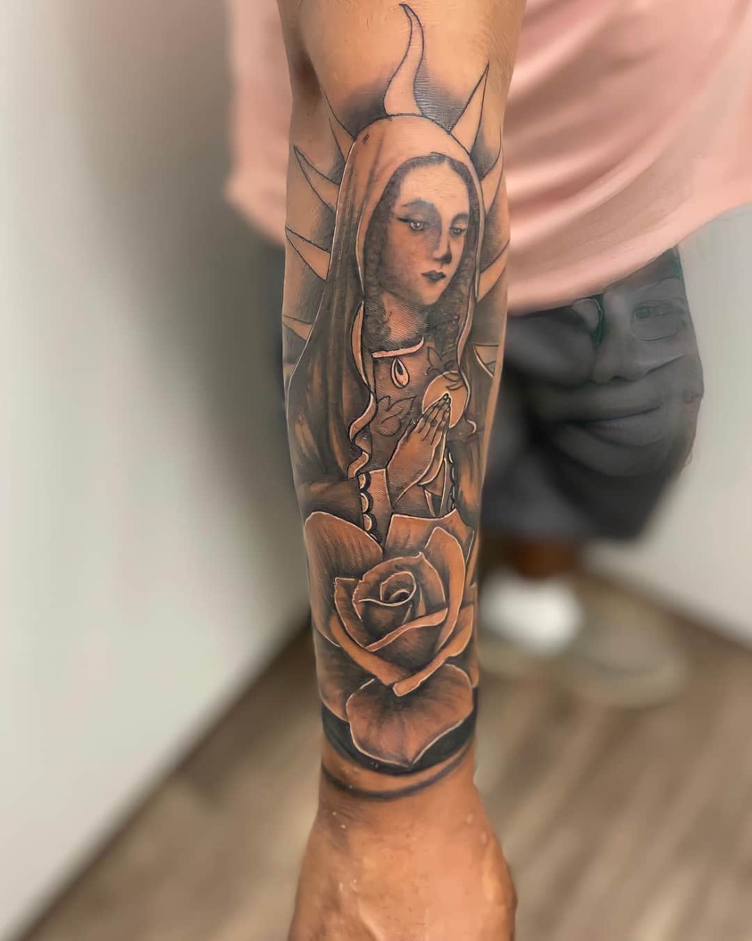 Madonna, rose and virgin of guadalupe tattoo on the forearm, half sleeve, Chicano style, by Inksane Shorty in Austin, TX