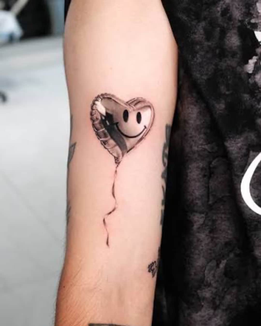 Small heart symbol tattoo on the forearm, Chrome style, by test in Lyon, France