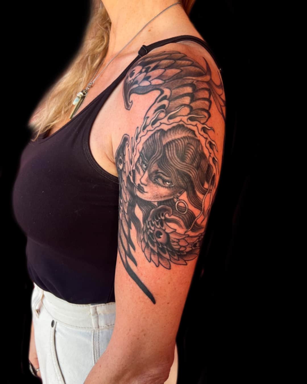 Griffin tattoo on the shoulder, half sleeve, Illustrative style, by Donny Newman in Austin, TX