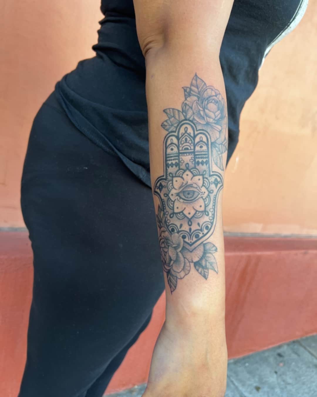 Hamsa, flower, ornamental filigree and mandala tattoo on the forearm, Illustrative style, by Donny Newman in Austin, TX