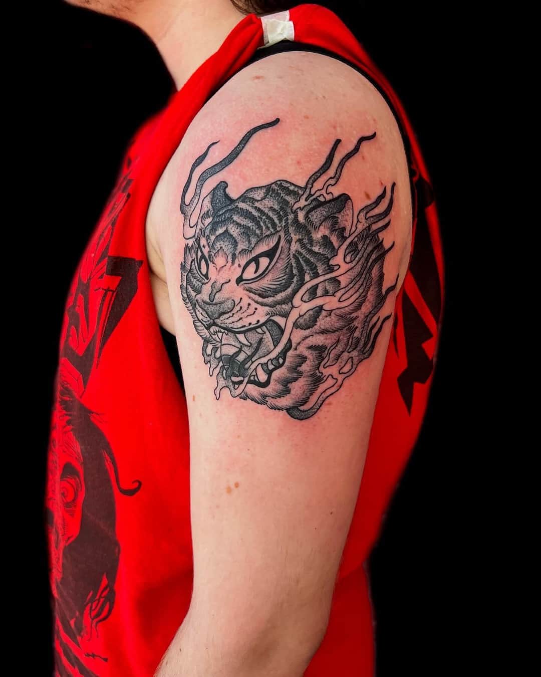 Small hannya mask and demon tattoo on the shoulder, Illustrative style, by Donny Newman in Austin, TX