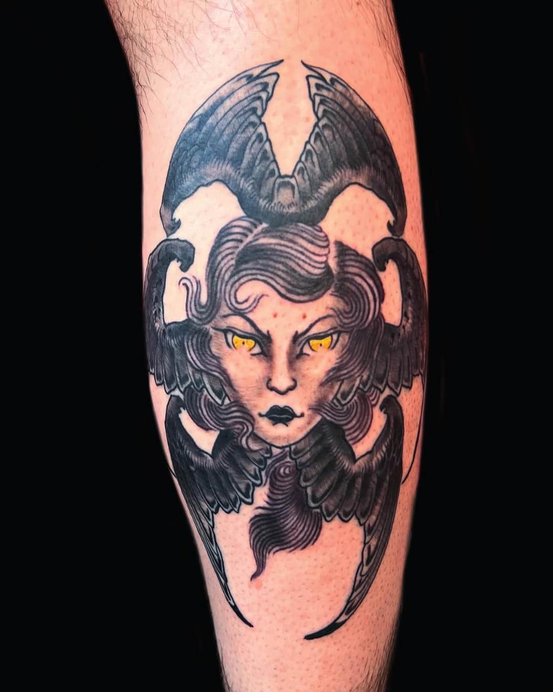 Small demon and female figure tattoo on the calf, Illustrative style, by Donny Newman in Austin, TX