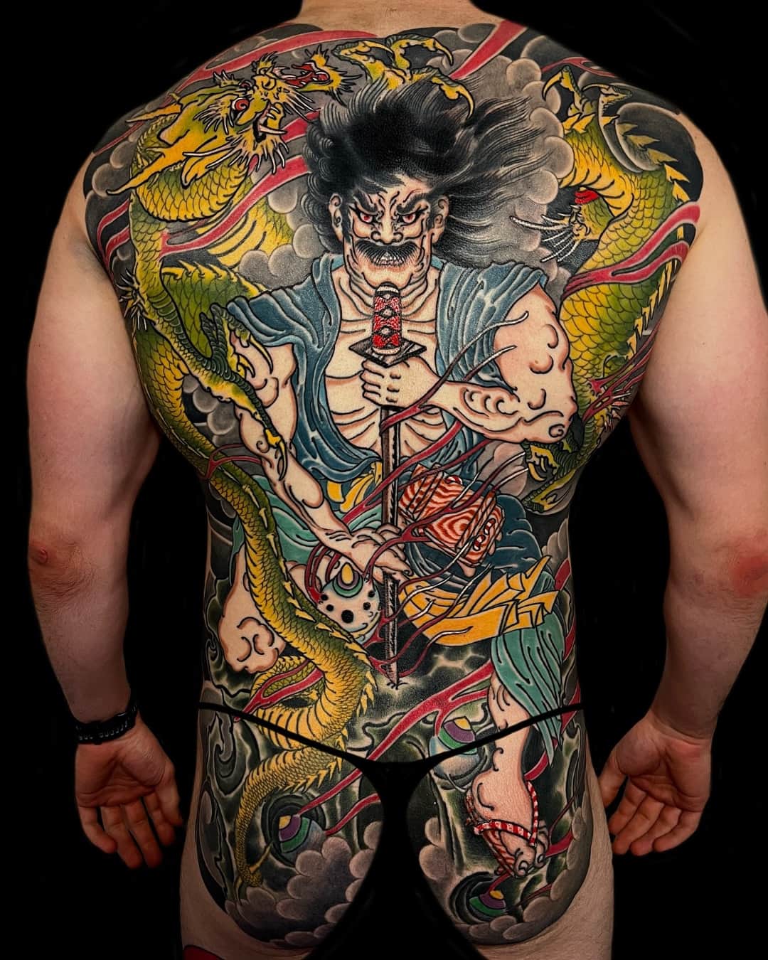 Demon, dragon and cloud tattoo on the back, back piece, Neo-Japanese style, by Donny Newman in Austin, TX