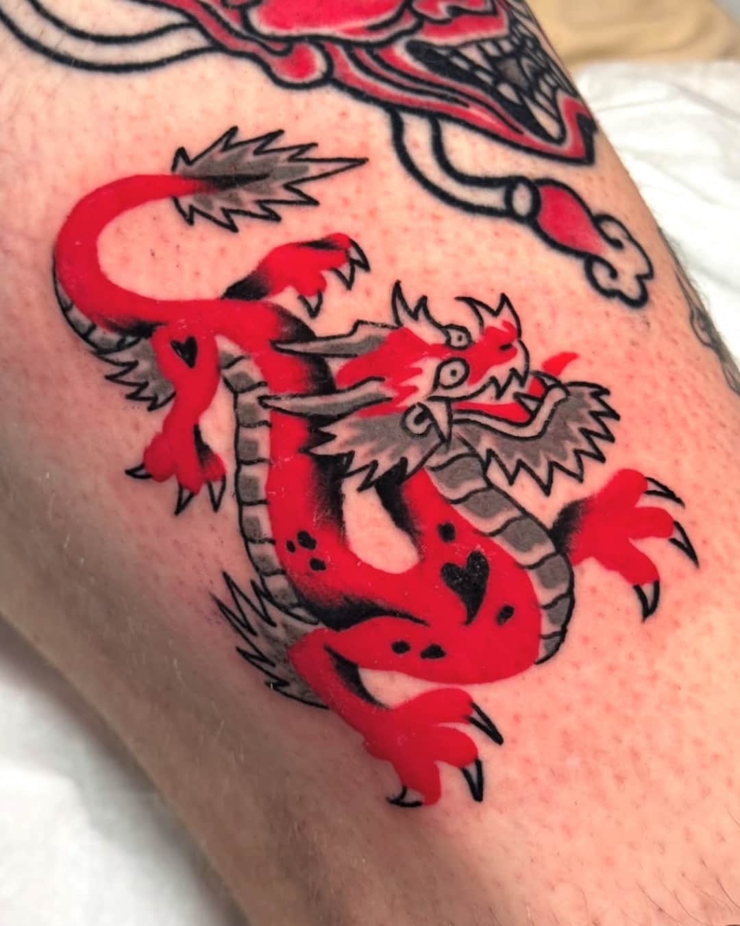 American Traditional tattoo by Hand In Glove Tattoo in Paris, France