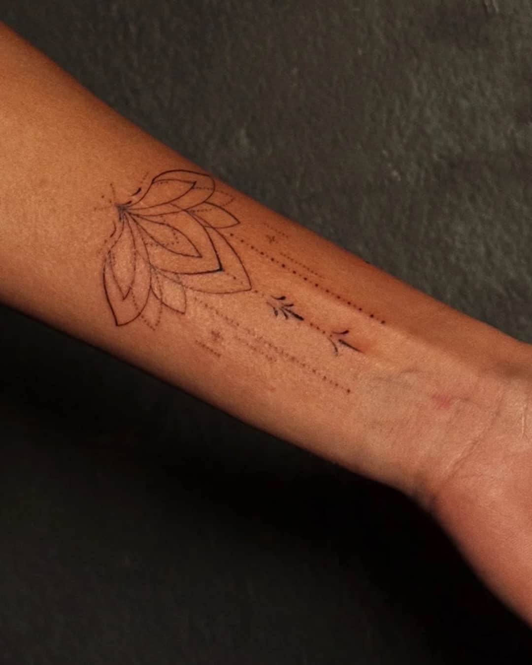 Small leaf and ornamental filigree tattoo on the forearm, Ornamental style, by Luisa Duarte in Austin, TX