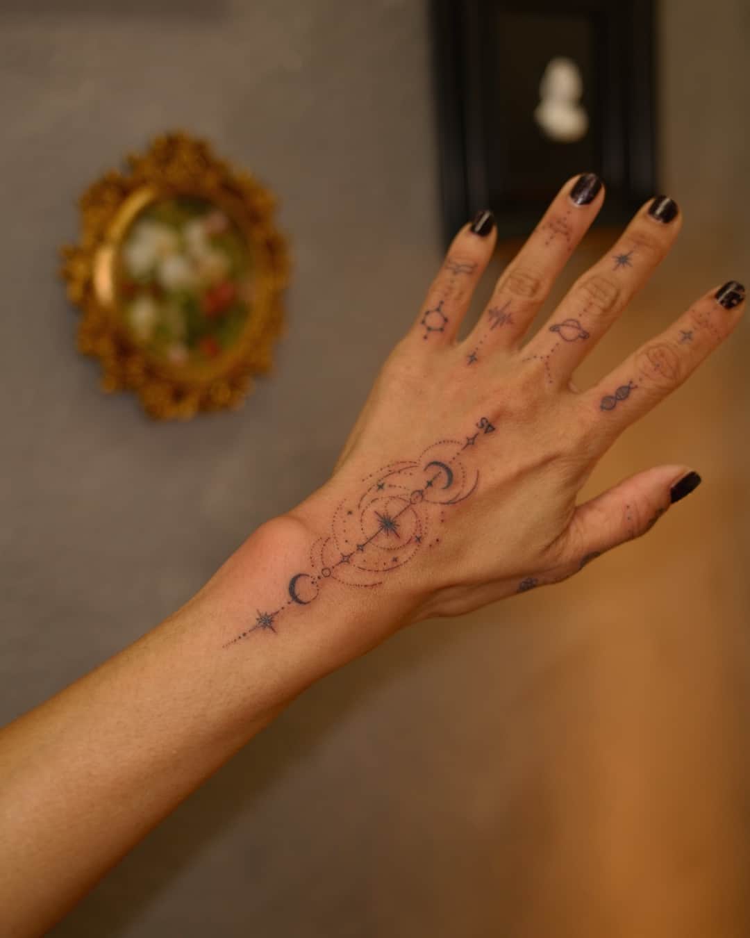 Moon, star and constellation tattoo on the hand, patchwork, Ornamental style, by Luisa Duarte in Austin, TX