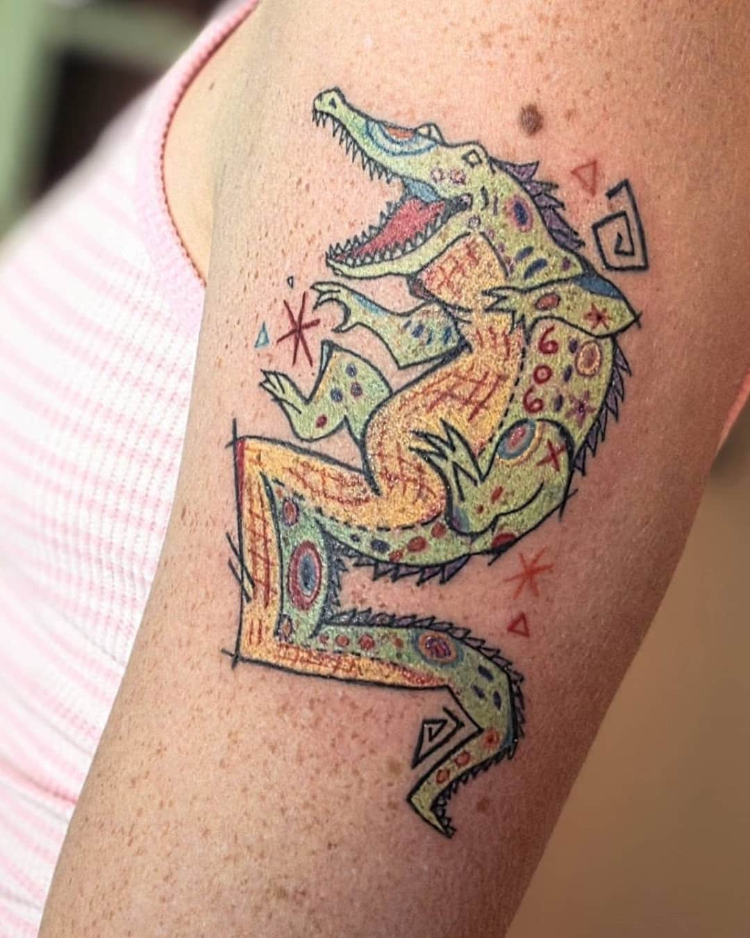 Lizard, crocodile and temporary tattoo on the upper arm, Sketch style, by Slowpoke Tattoo in Austin, TX