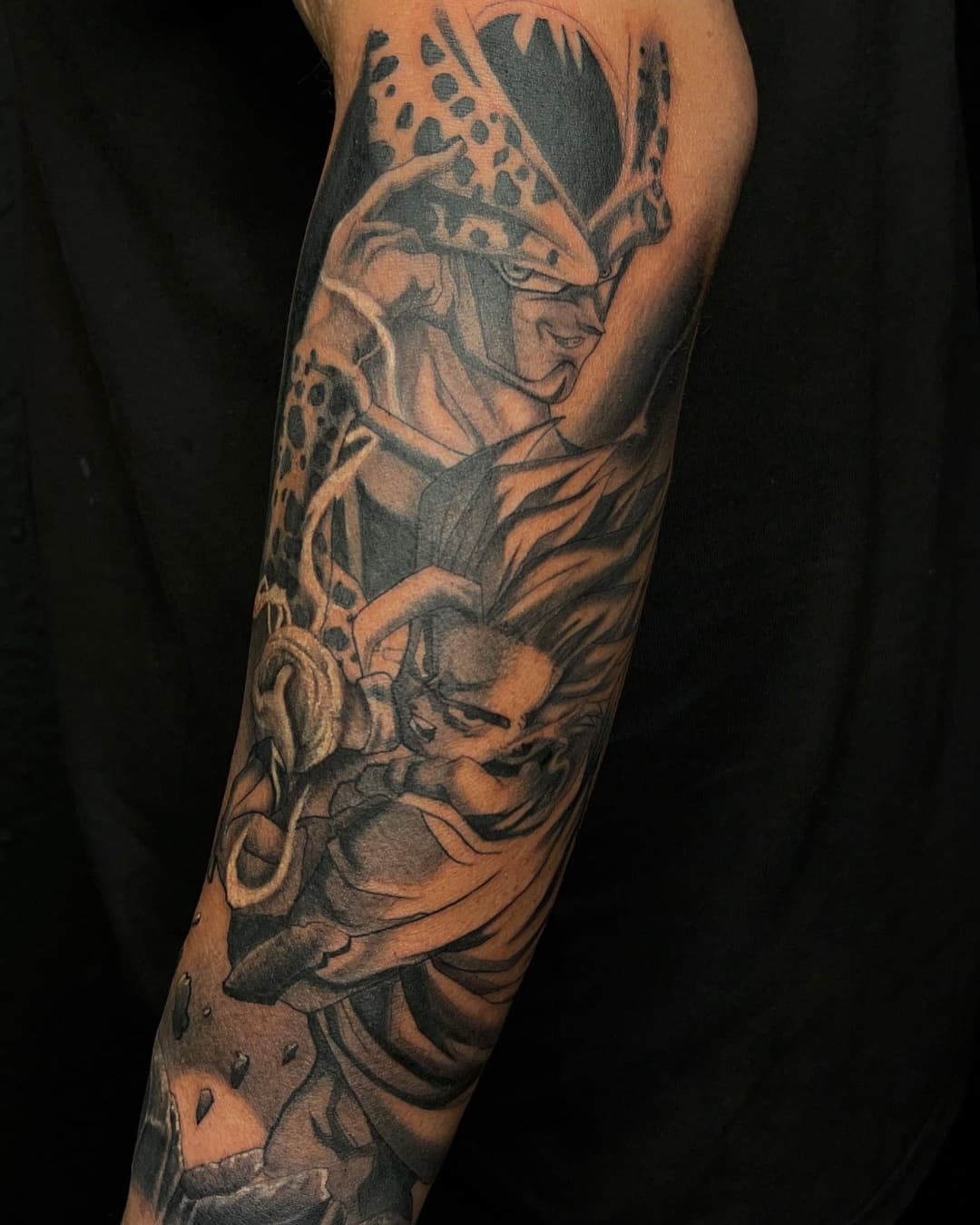 Anime character, dragon ball, cell and gohan tattoo on the forearm, Anime & Pop Culture style, by Inksane Shorty in Austin, TX