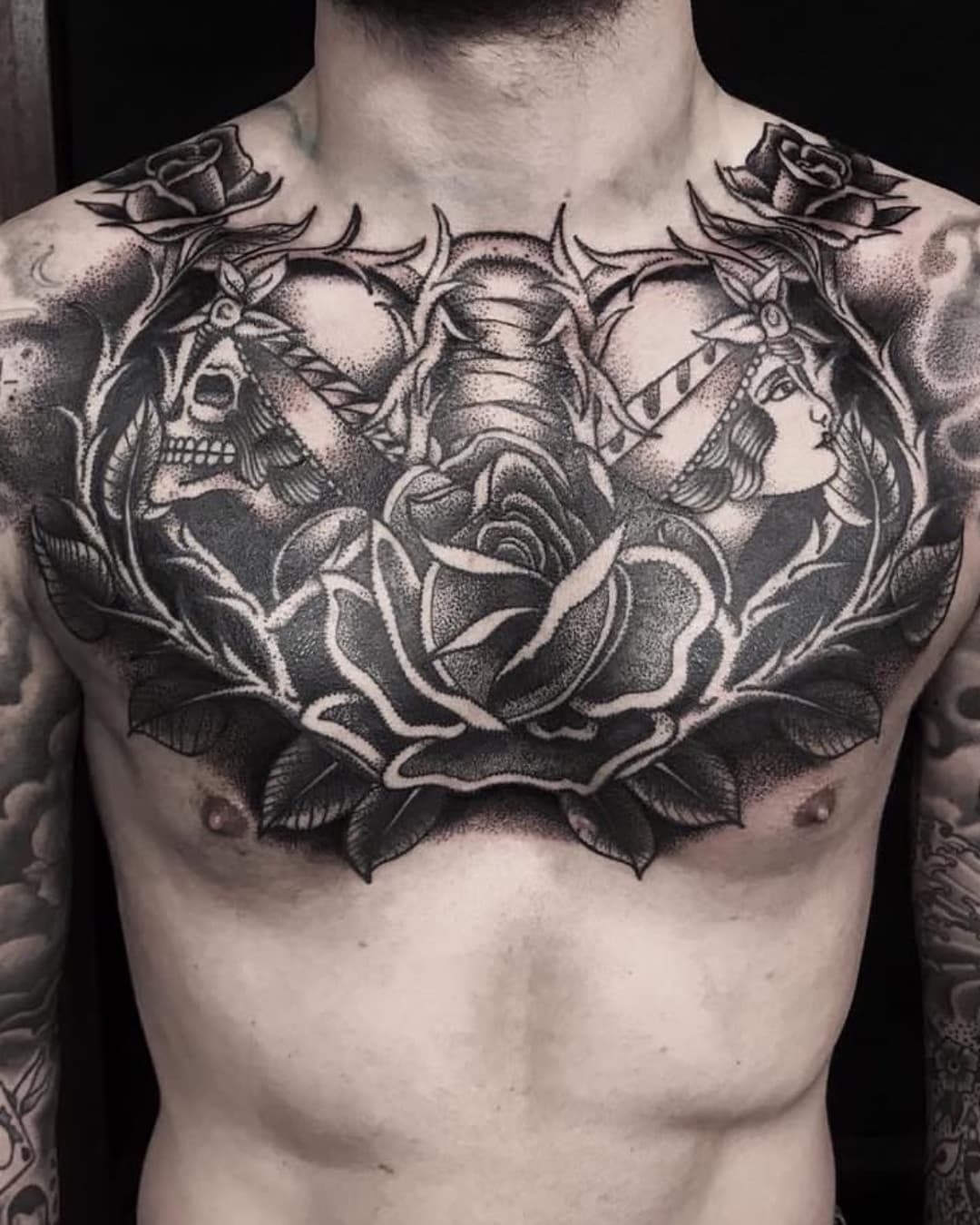 Blackwork tattoo by Hand In Glove Tattoo in Paris, France