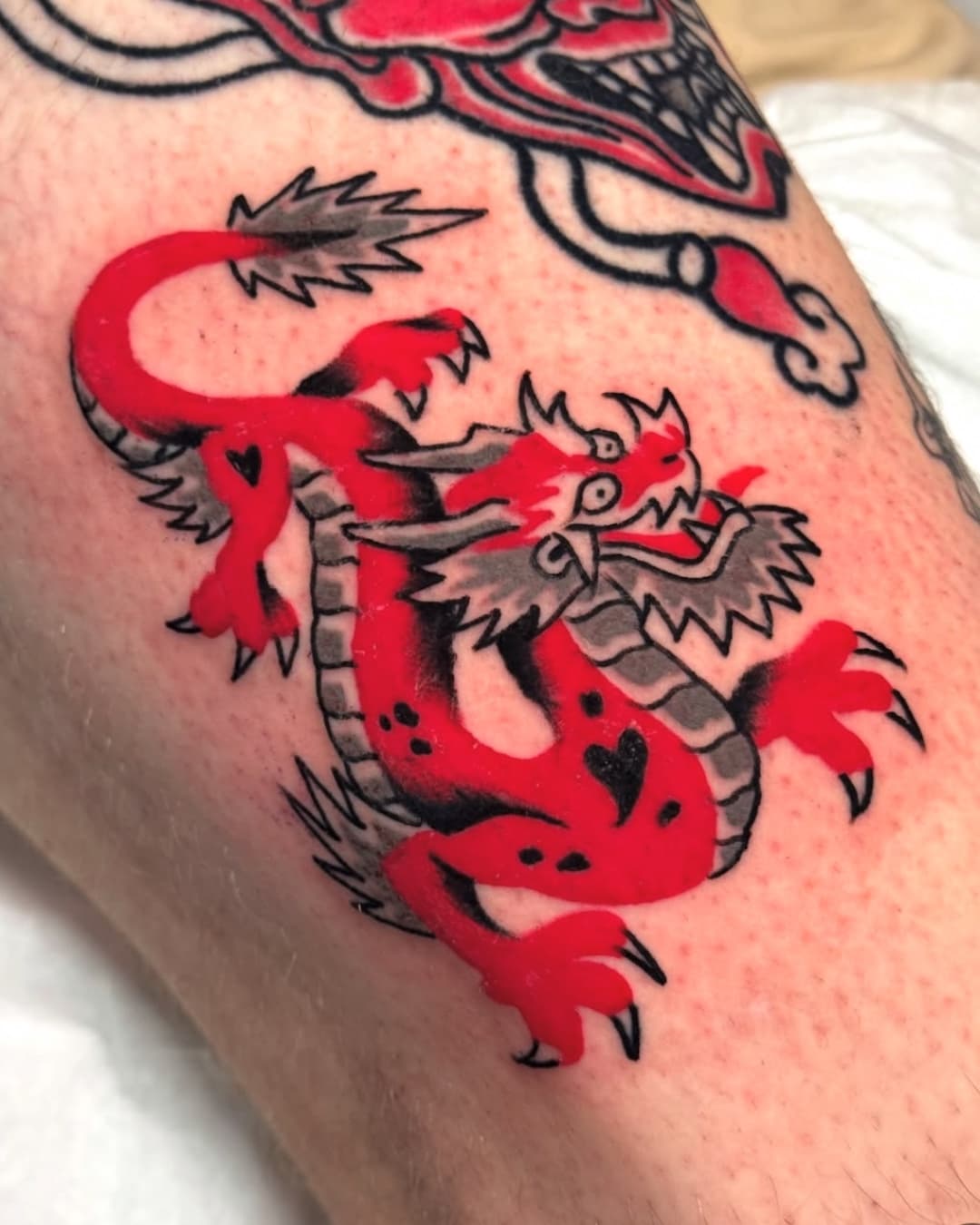 American Traditional tattoo by Hand In Glove Tattoo in Paris, France